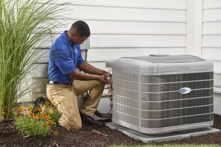 Service technician working on an air conditioner
